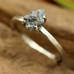 A raw diamond engagement ring from The Metal Studio Chiang Mai from their rough diamond collection 