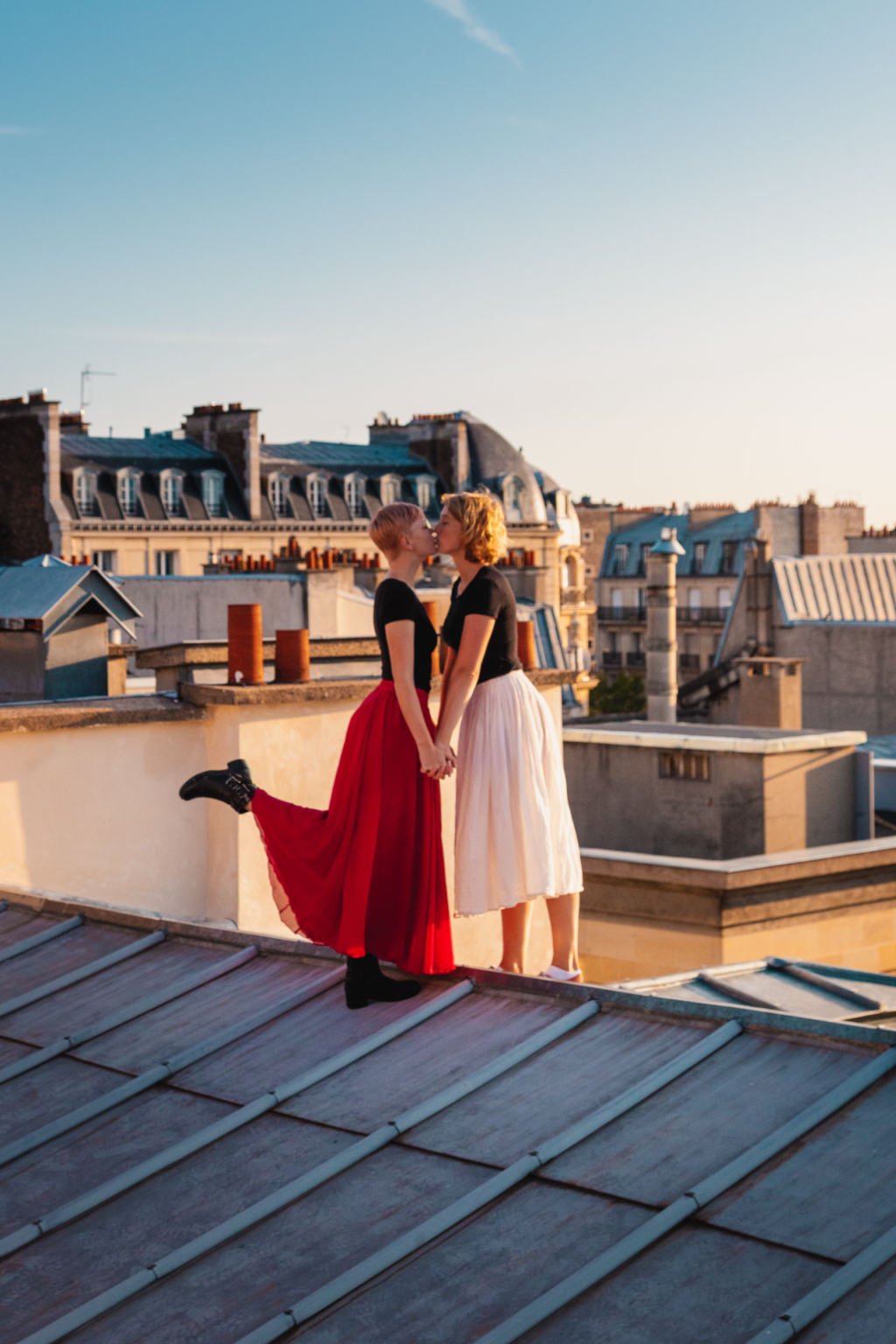 Two girls kissing on Paris rooftops, Toits de Paris
