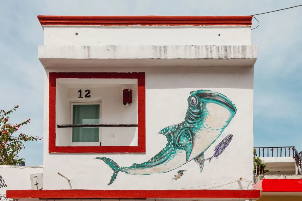 Sea Walls, Artists for Oceans, The Traveler by Cinzah Merkens, Isla Mujeres things to do, street art Cancun