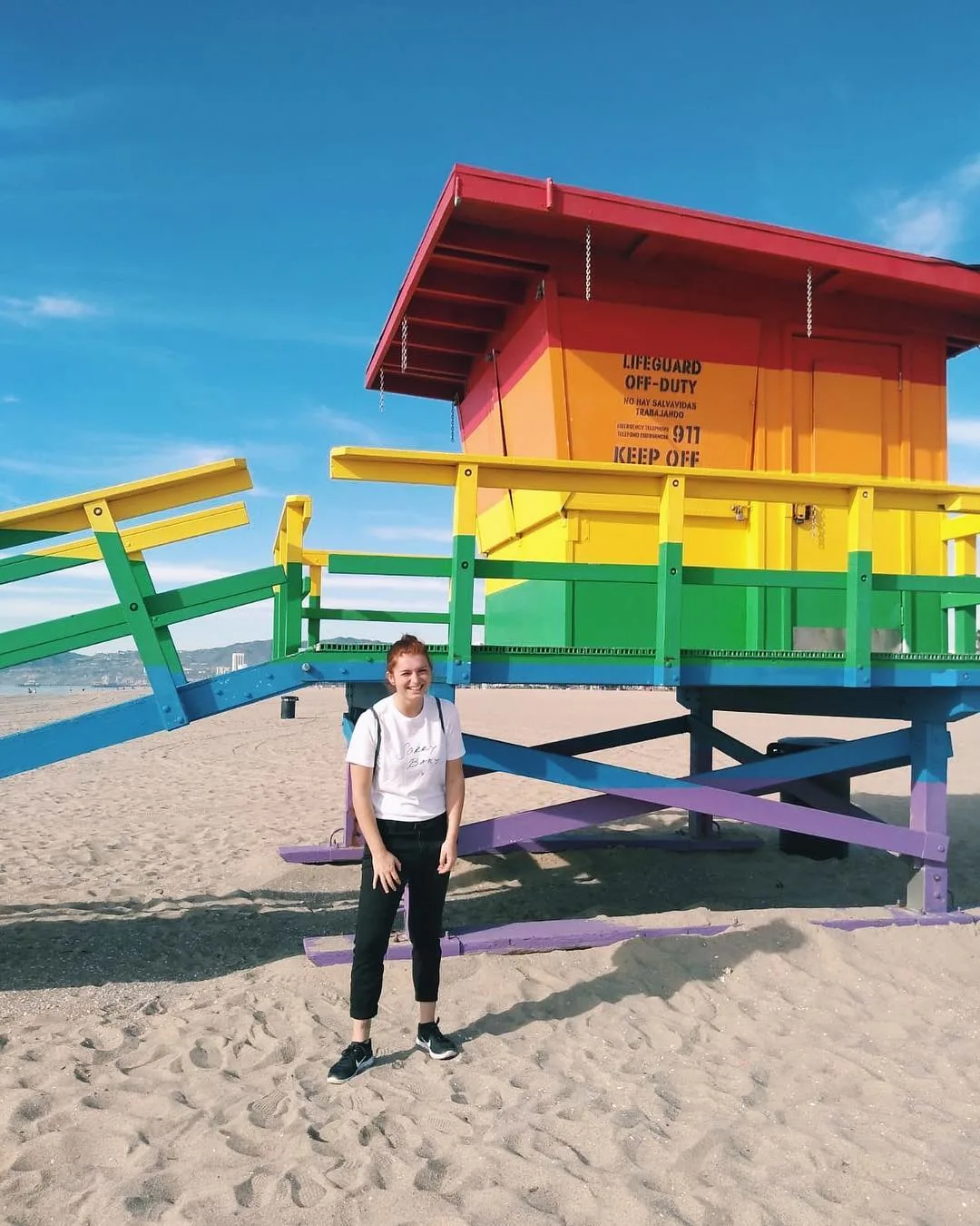 Venice Pride Lifeguard Tower in Los Angeles with lesbian local Esmee