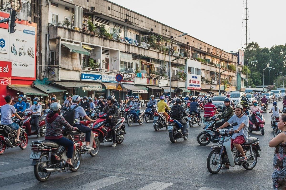 Vietnam by motorbike local traffic transportation in vietnam