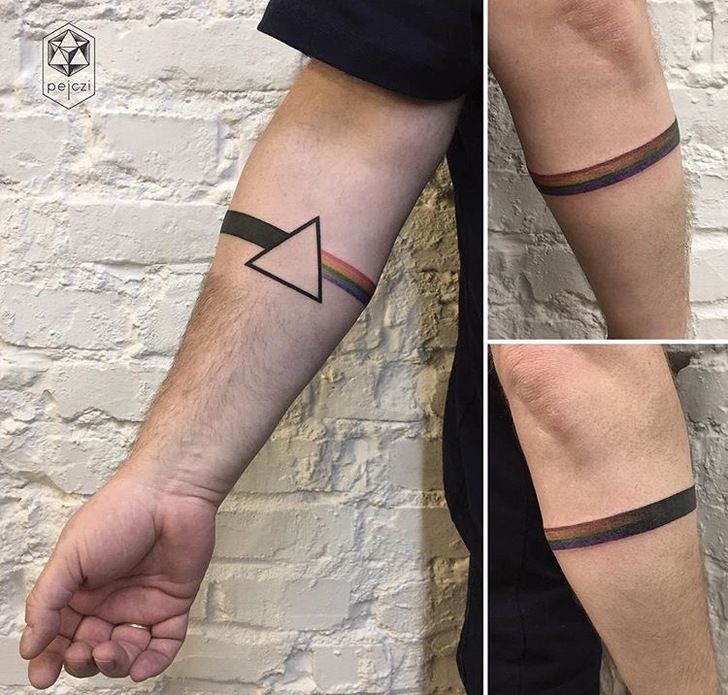 Arm band triangle rainbow tattoo by pejczi tattoo artist