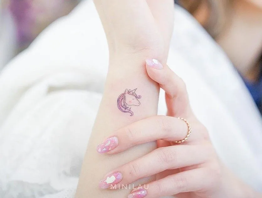 Unicorn Tattoo by tattoo artist minilau mini_tattooer